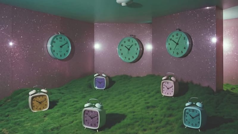 A room full of clocks, each showing a different time